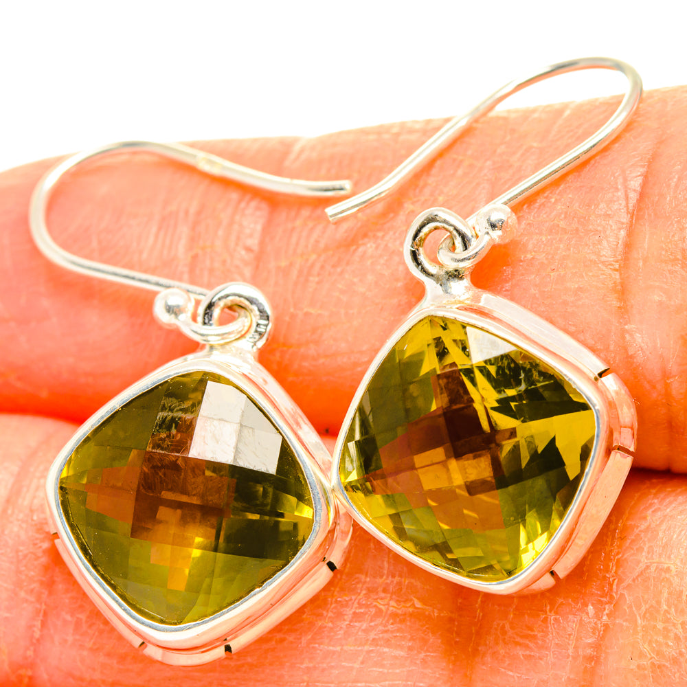 Sterling silver lemon quartz drop earrings with faceted teardrop stones, fishhook backs