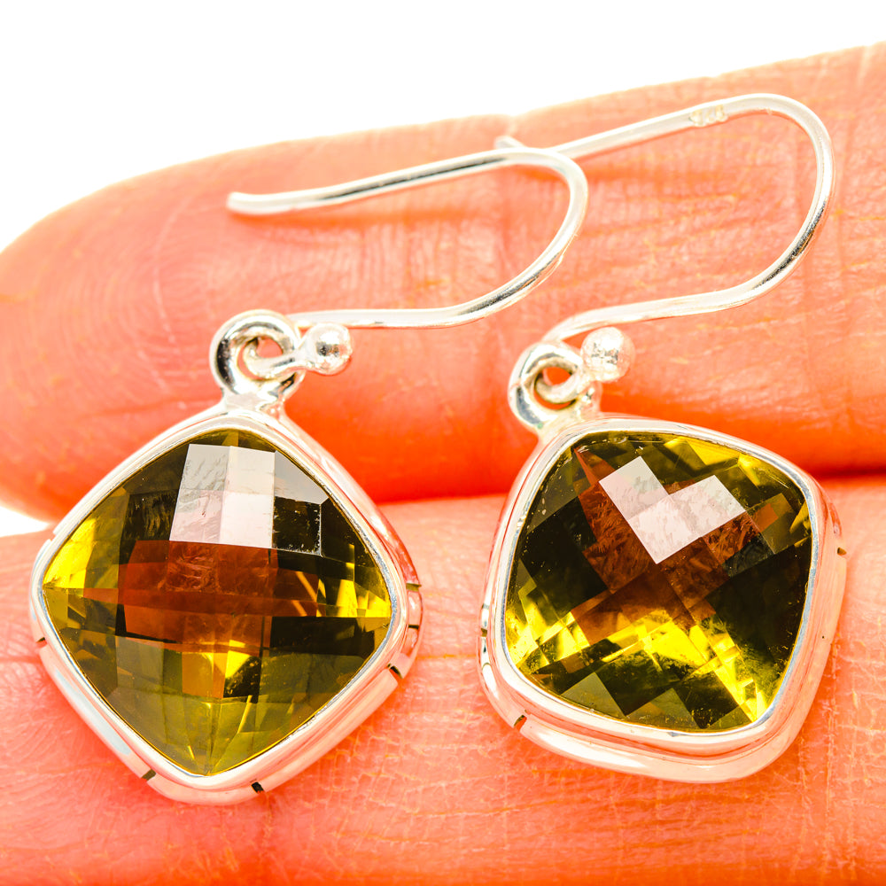Sterling silver drop earrings with faceted olive quartz teardrop stones