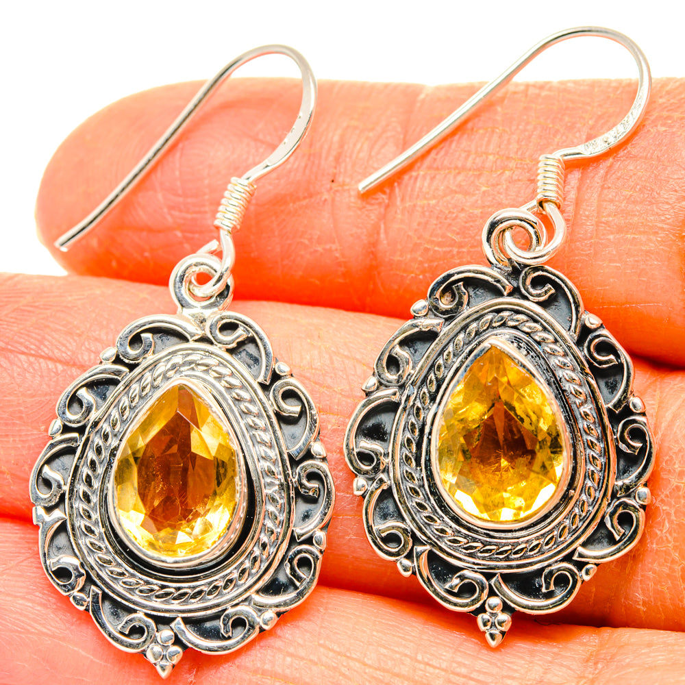 Oval citrine drop earrings in ornate 925 sterling silver setting with hook backs