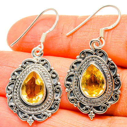 Oval citrine drop earrings in ornate 925 sterling silver setting with hook backs