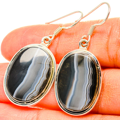 Sterling silver oval agate drop earrings with dark striped cabochons