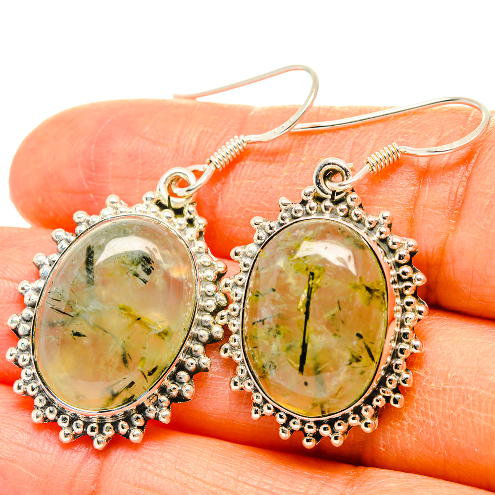 Oval green prehnite drop earrings with ornate silver bead bezel and hook backs