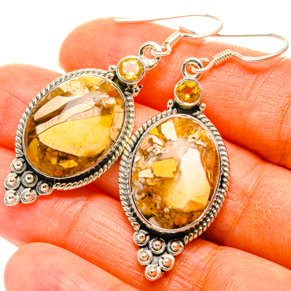 925 sterling silver citrine drop earrings close-up, oval golden stone settings with beadwork