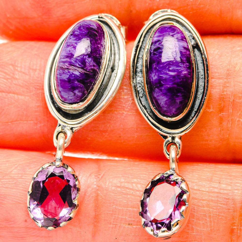 Sterling silver dangling earrings with oval purple charoite and amethyst drop stones