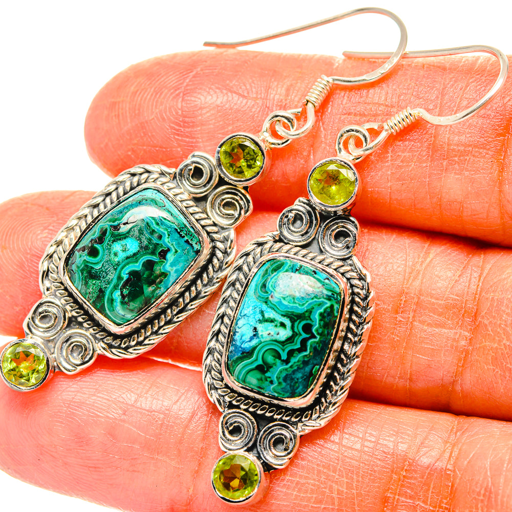 Sterling silver oval dangle earrings with turquoise malachite/chrysocolla stone and peridot studs.