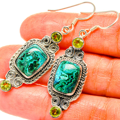 Sterling silver oval dangle earrings with turquoise malachite/chrysocolla stone and peridot studs.