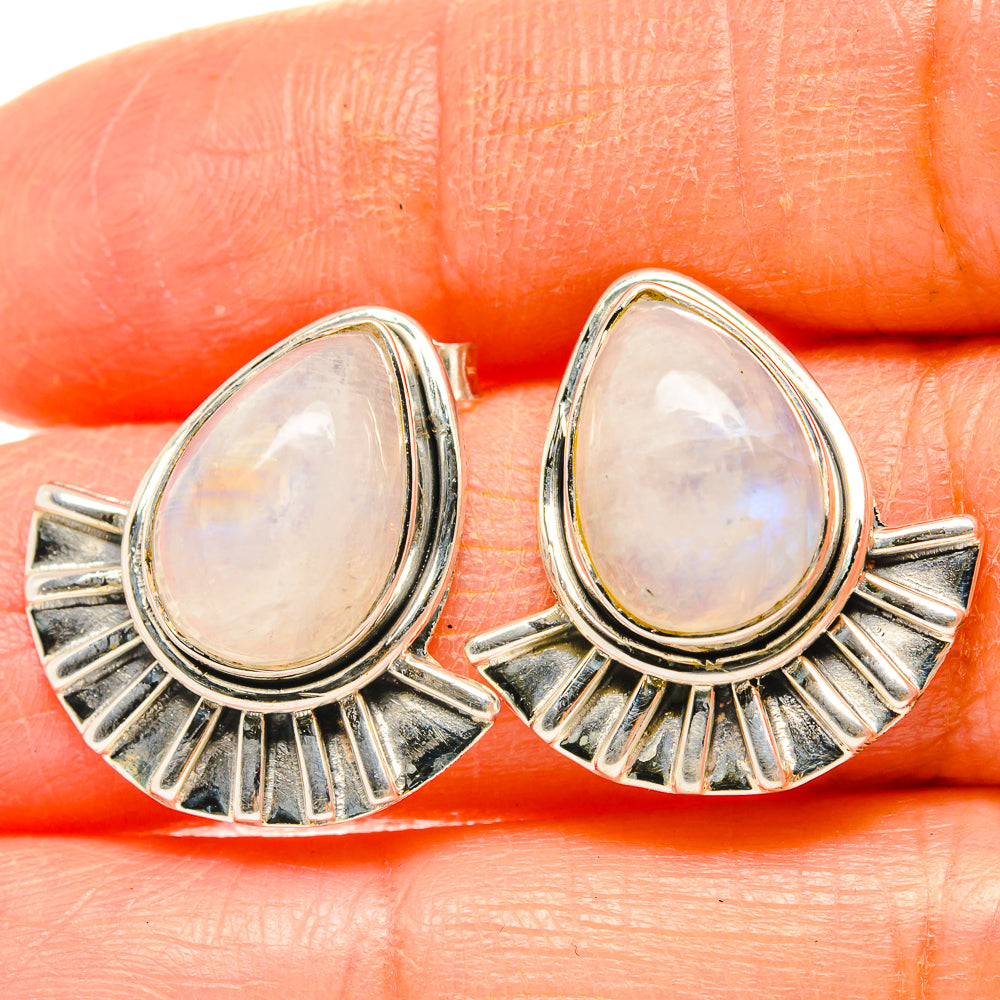 Sterling silver teardrop moonstone cabochon earrings with fan-shaped ray settings