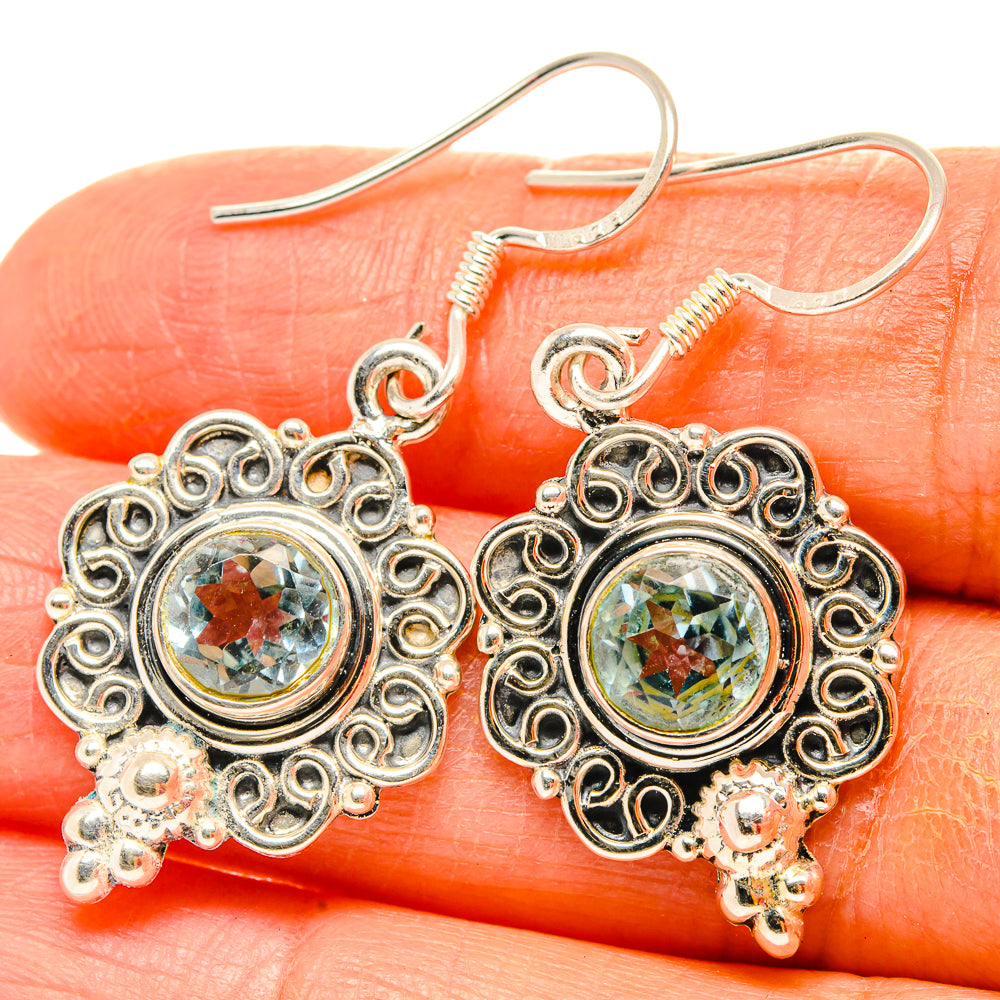 Sterling silver filigree drop earrings with round gemstone and flower charm