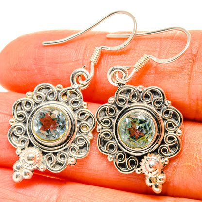Sterling silver filigree drop earrings with round gemstone and flower charm