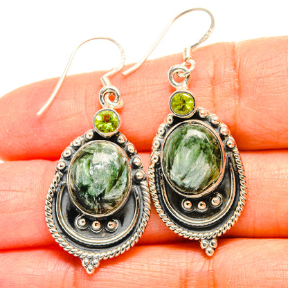 Sterling silver drop earrings with oval green seraphinite and round peridot accents
