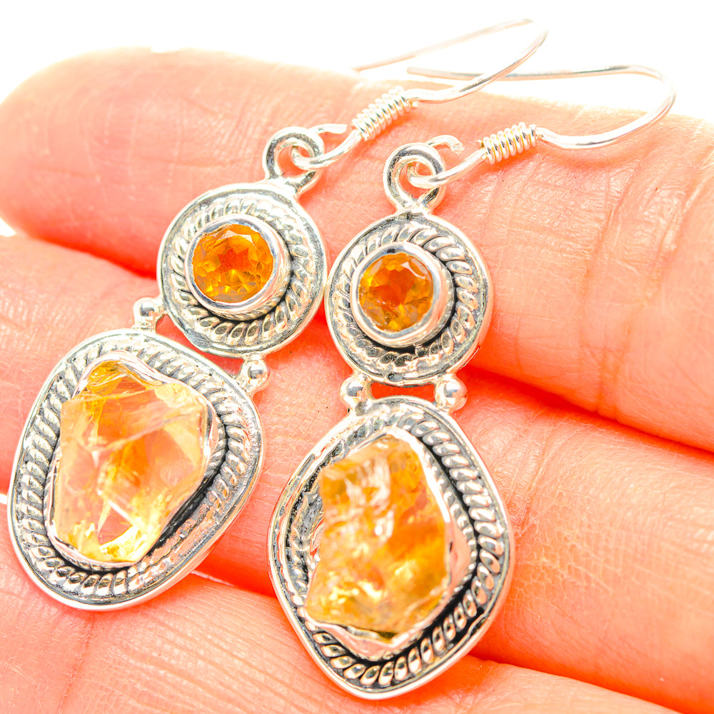 925 sterling silver earrings with orange round and oval drop stones, hook backs