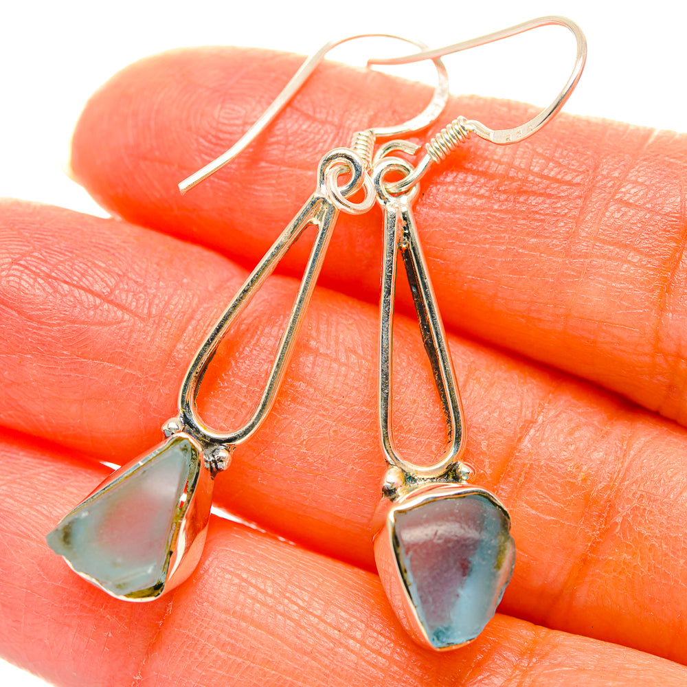 Sterling silver aquamarine drop earrings with rough teardrop stones and fish hooks