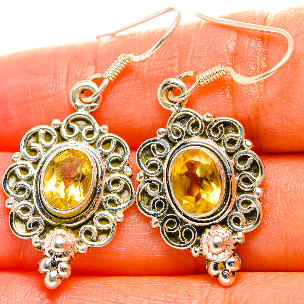 Sterling silver citrine drop earrings with round yellow stones