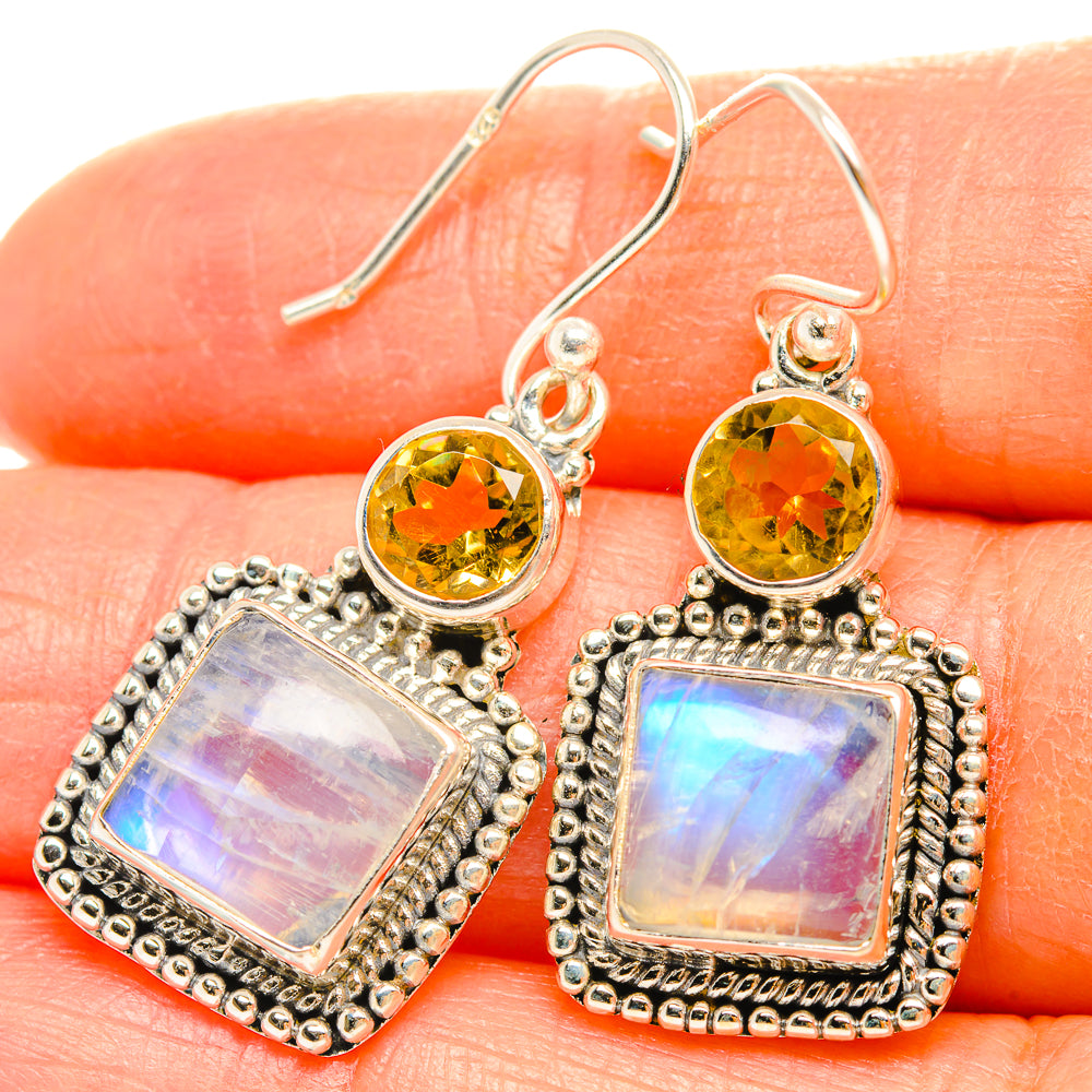 Round yellow top with square blue-pink iridescent drops, sterling silver hooks