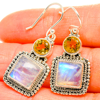 Round yellow top with square blue-pink iridescent drops, sterling silver hooks