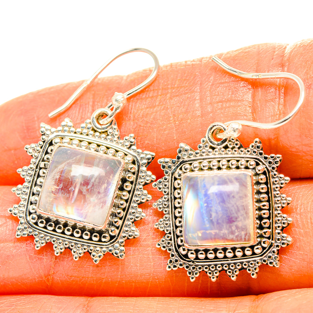 Sterling silver square moonstone earrings with iridescent rainbow sheen, detailed bezel