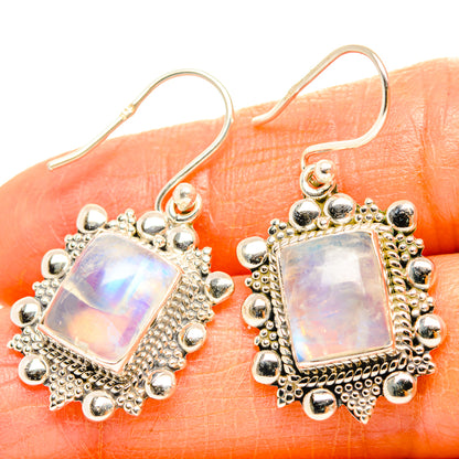 Moonstone drop earrings in square silver settings with rainbow iridescence and bead border