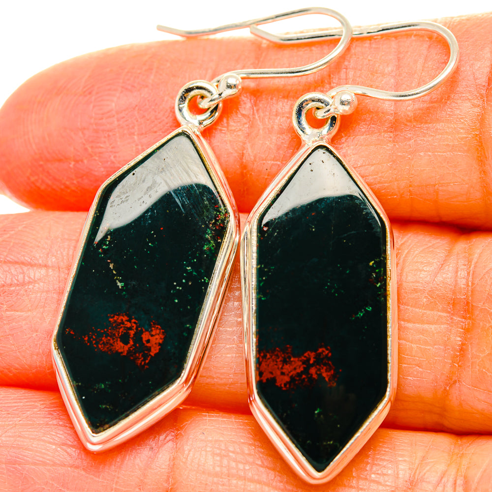 Close-up of sterling silver marquise dangle earrings with green bloodstone and red flecks