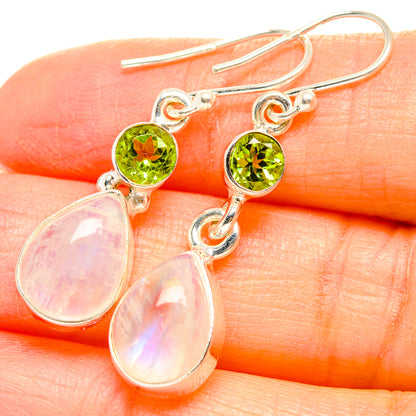 Sterling silver drop earrings with green round stone and two opalescent teardrop dangles
