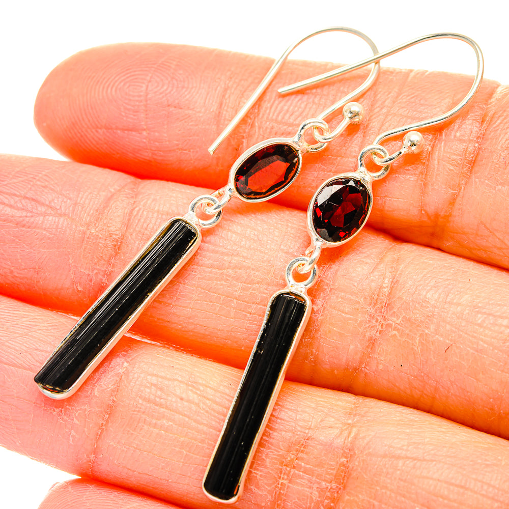 Sterling silver drop earrings with red oval gemstone and black tourmaline bar charms