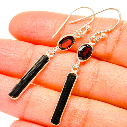 Sterling silver drop earrings with red oval gemstone and black tourmaline bar charms