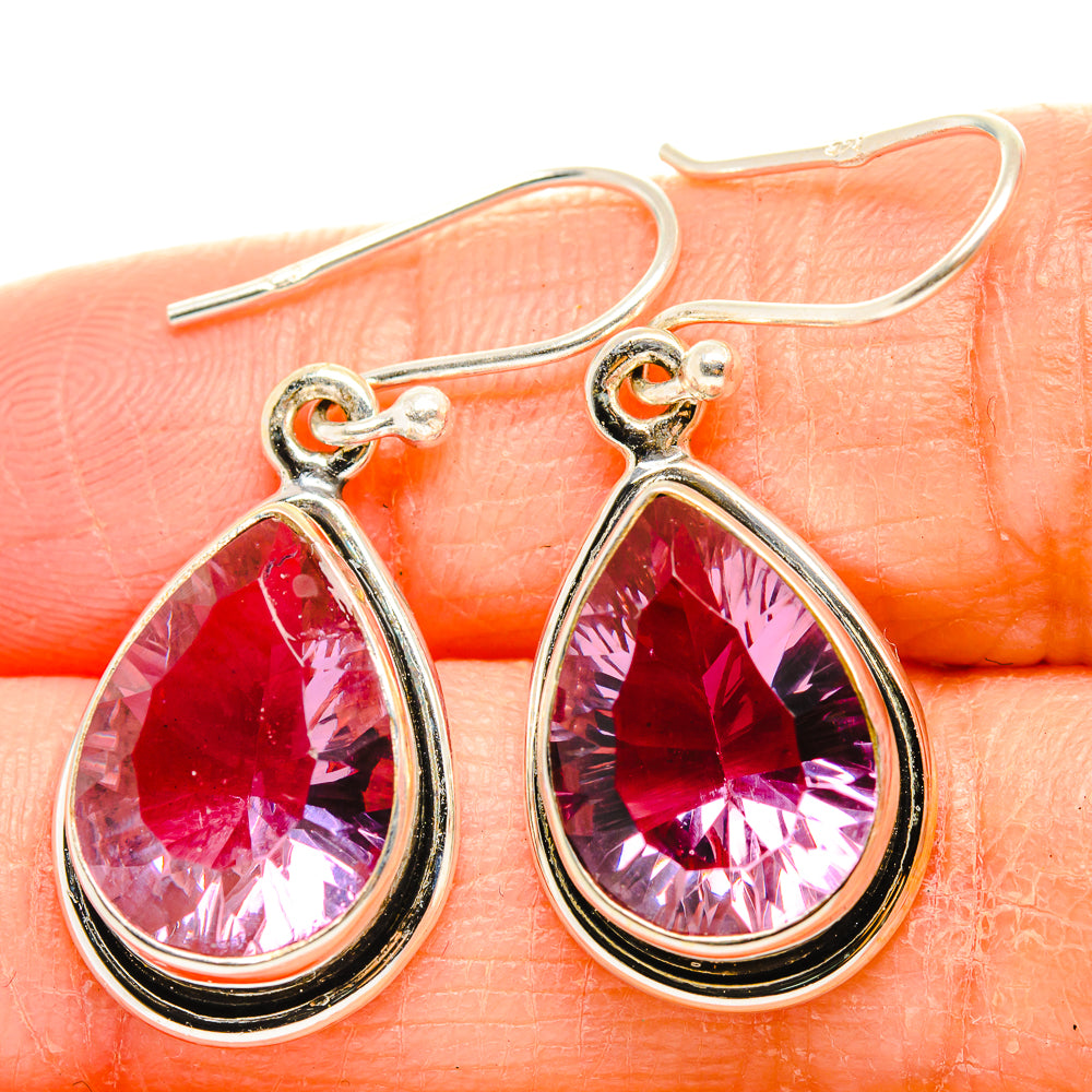 Faceted color-change alexandrite lab earrings, teardrop pink-to-purple stones, silver hooks