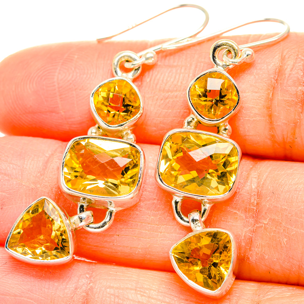Faceted citrine drop earrings with yellow-orange stones in sterling silver, heart and round shapes