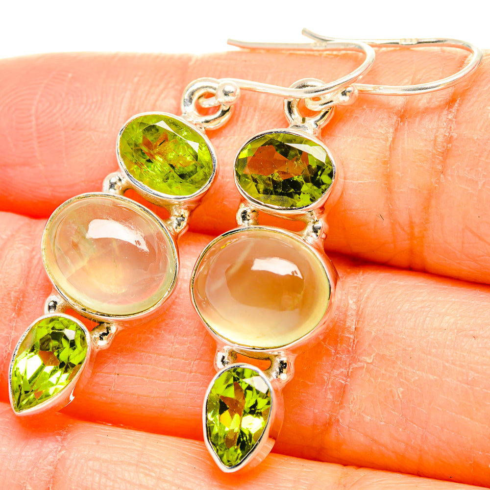 Gold-tone silver earrings with round peridot green stones and pale prehnite ovals