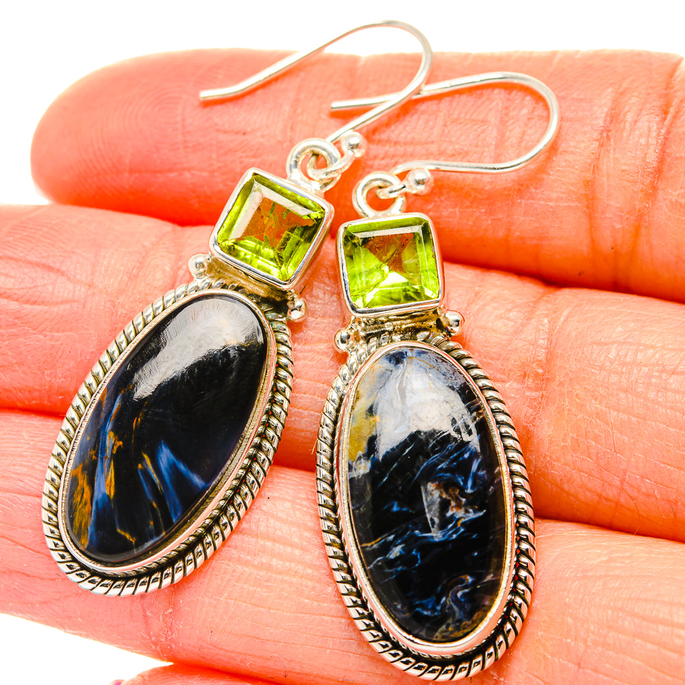 Sterling silver dangle earrings with green square gemstone and oval blue pietersite drops