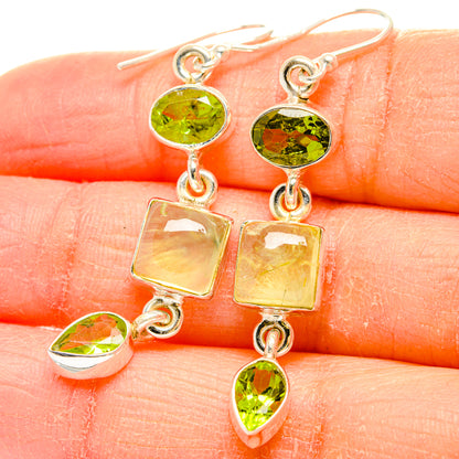 925 sterling silver drop earrings close-up: green oval, square pale stone, and pear dangles