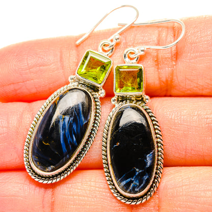 Sterling silver drop earrings with peridot green square tops and oval blue pietersite