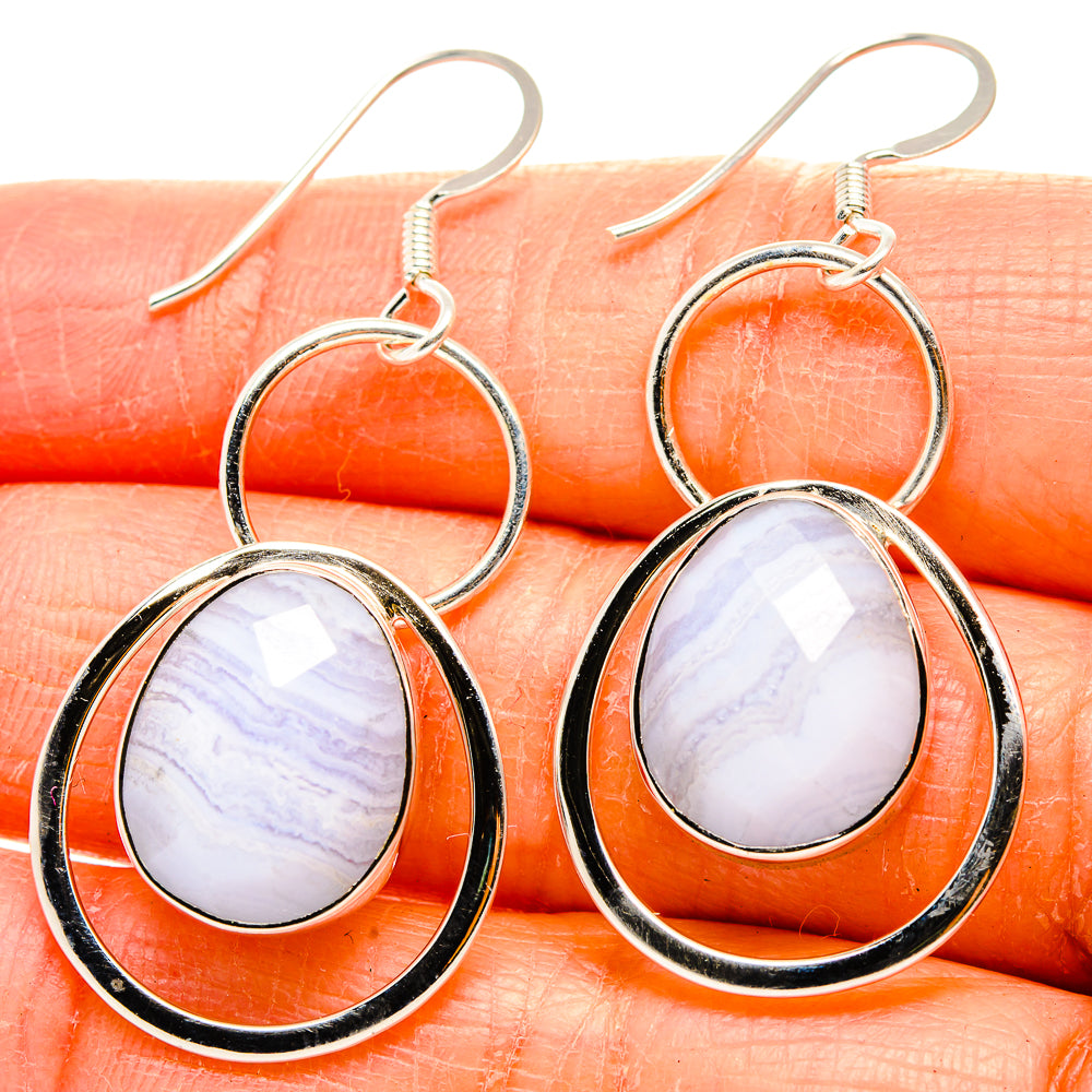 Silver drop earrings with oval blue lace agate cabochon, black bezel, fishhook backs