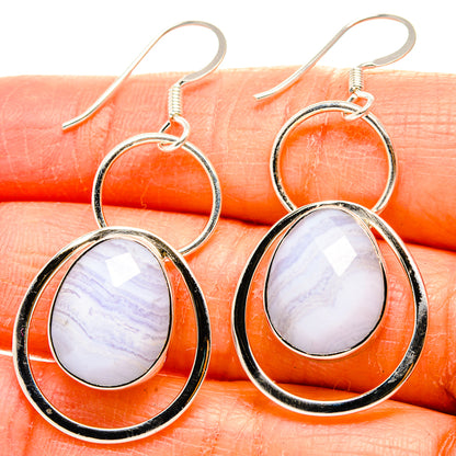 Silver drop earrings with oval blue lace agate cabochon, black bezel, fishhook backs