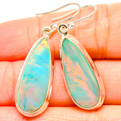 Sterling silver teardrop opal earrings with iridescent rainbow gemstone