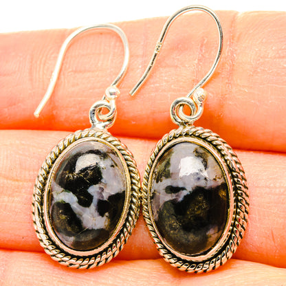 Oval dark green stone drop earrings with white veining, silver rope bezel