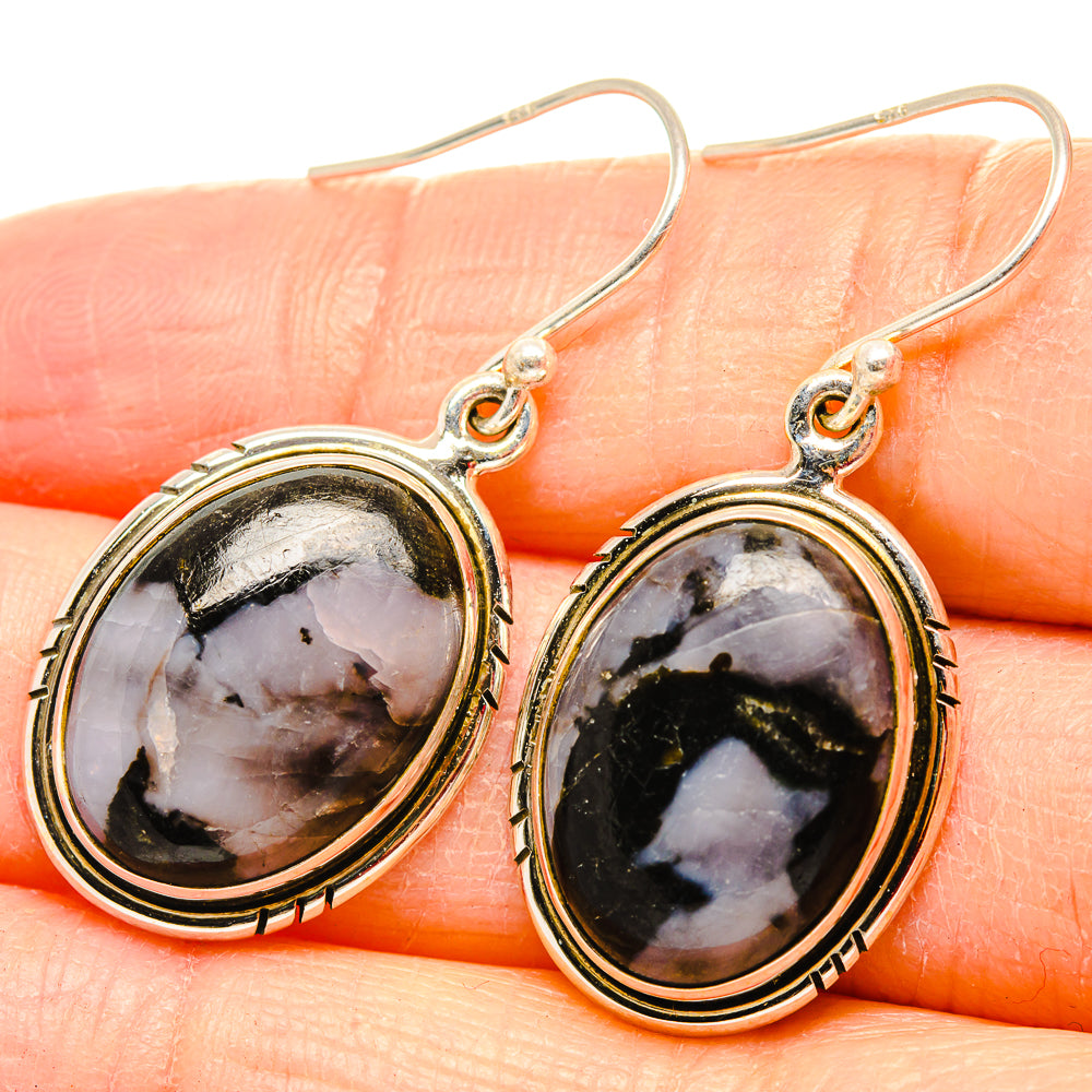 Gold-tone 925 sterling silver oval gabbro stone drop earrings with fishhooks, close-up