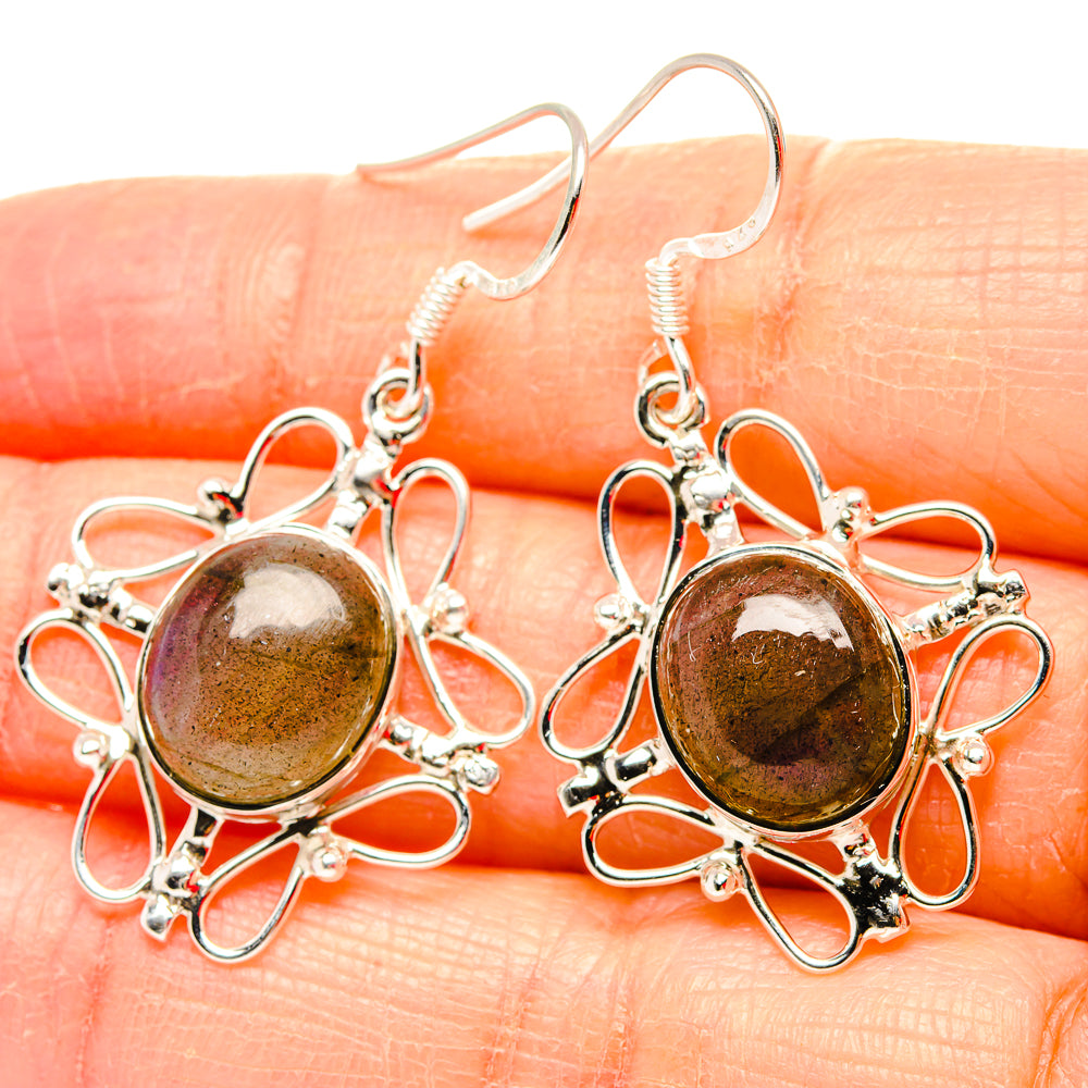 Sterling silver labradorite drop earrings with oval brown stones and ornate floral settings