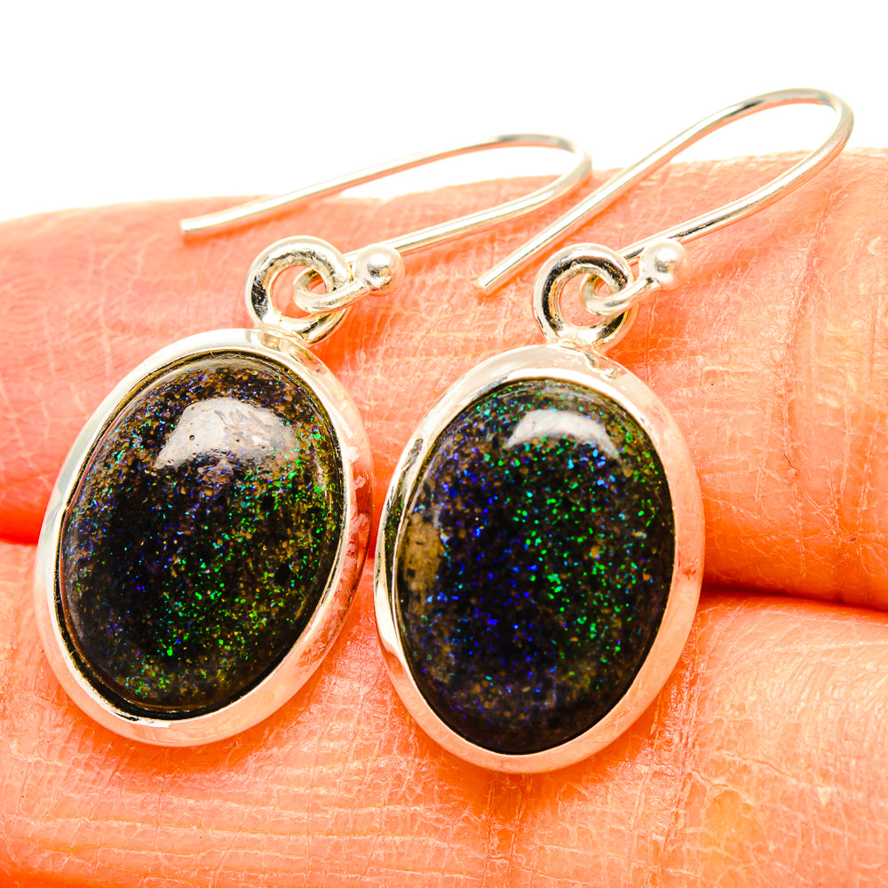 Sterling silver oval opal drop earrings with dark blue-green iridescent cabochons