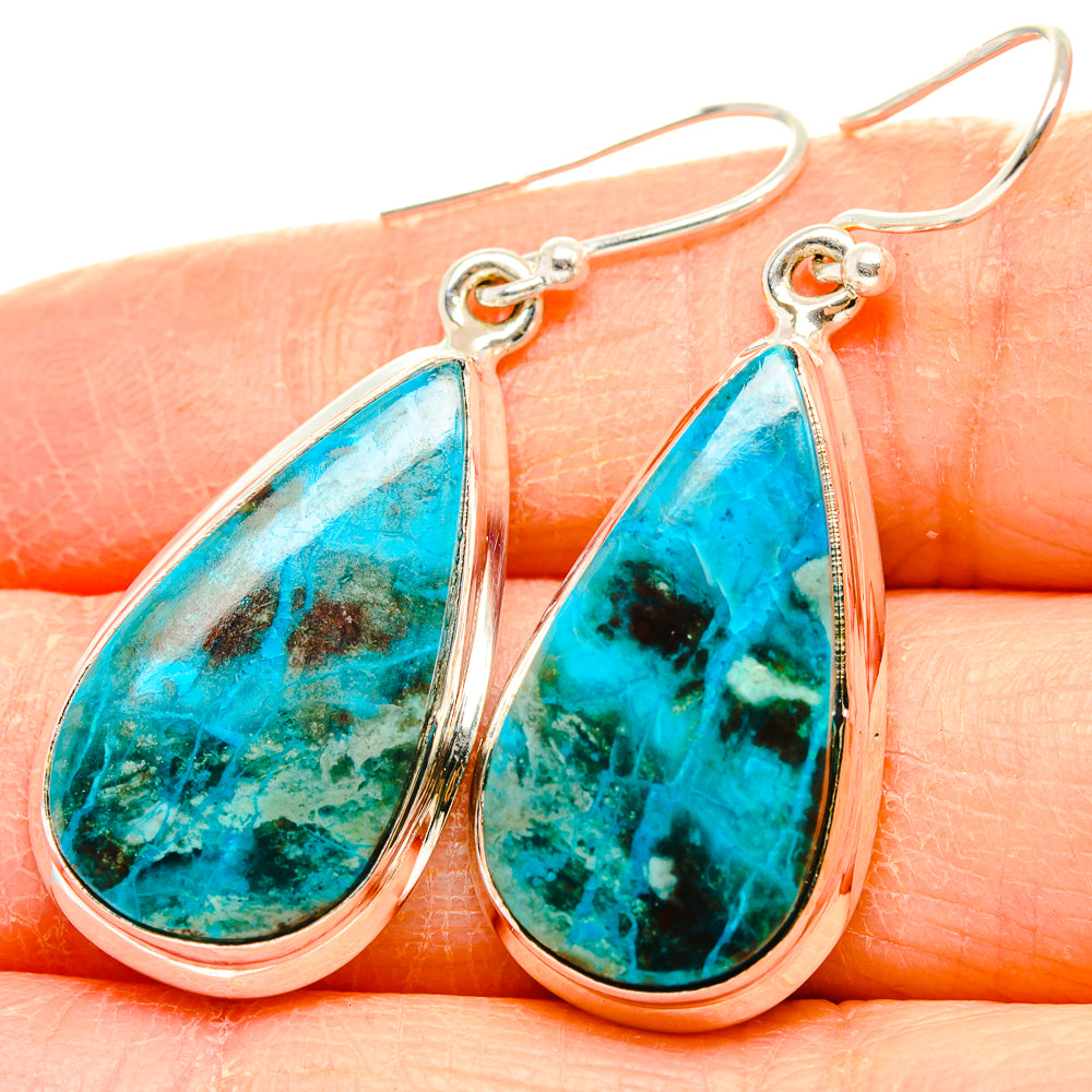 Sterling silver teardrop chrysocolla drop earrings, turquoise-blue stone close-up