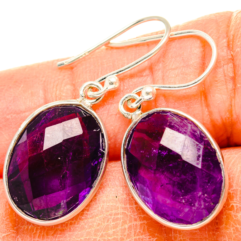 Oval faceted amethyst drop earrings with sterling silver bezel and curved hooks