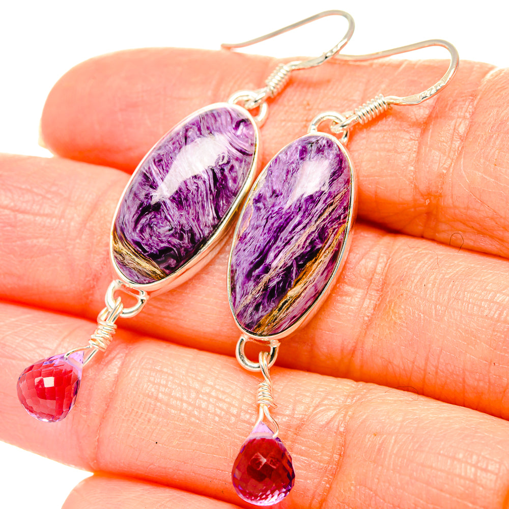 Sterling silver drop earrings: oval purple cabochons with red teardrop dangles
