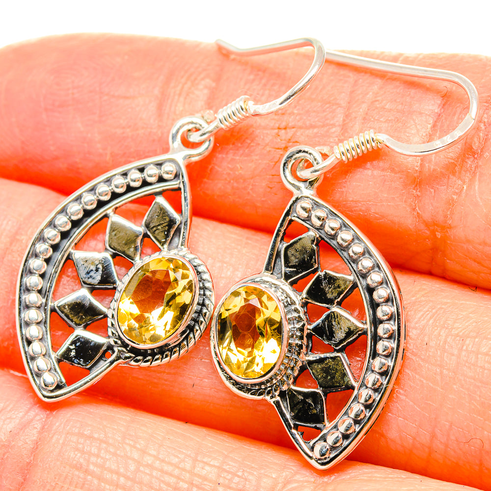 Sterling silver citrine drop earrings with faceted yellow stones and black geometric inlay