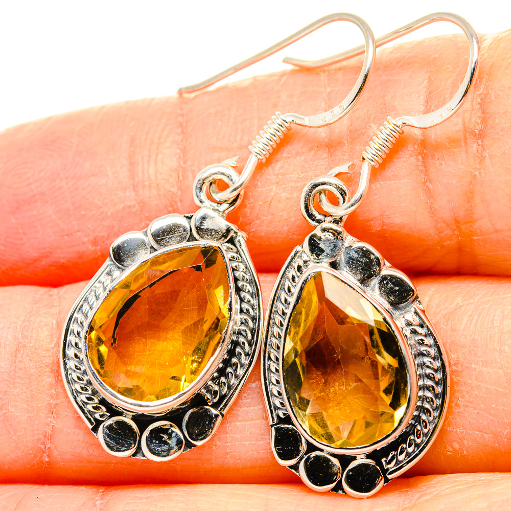 Teardrop citrine drop earrings, 925 sterling silver with scalloped border and dark accents