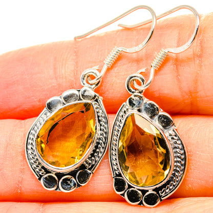 Teardrop citrine drop earrings, 925 sterling silver with scalloped border and dark accents