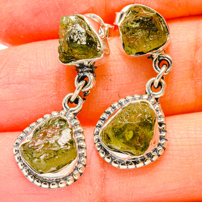 Sterling silver dangle earrings with rough green peridot teardrop drops and chain links