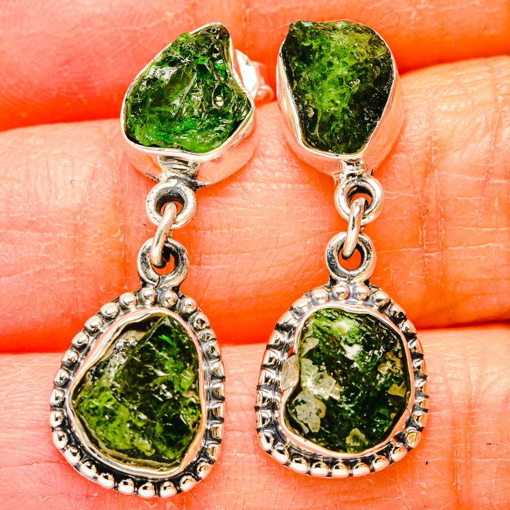 Pair of silver drop earrings with rough green diopside stones and bead-edged bezels