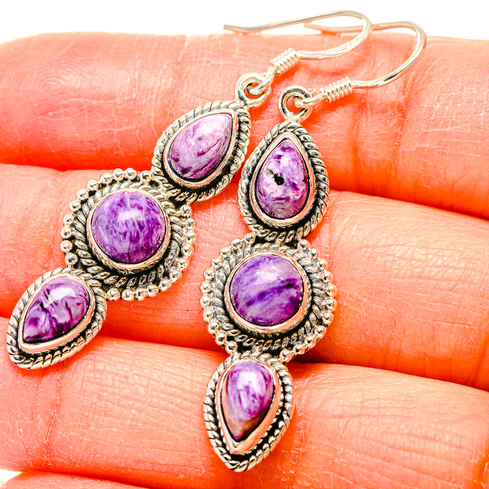 925 sterling silver charoite dangle earrings with purple teardrop stones and ornate texture