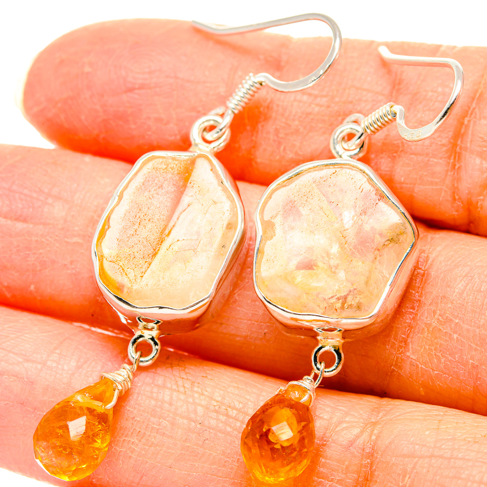 Sterling silver citrine drop earrings with rough oval stones and yellow teardrop charms