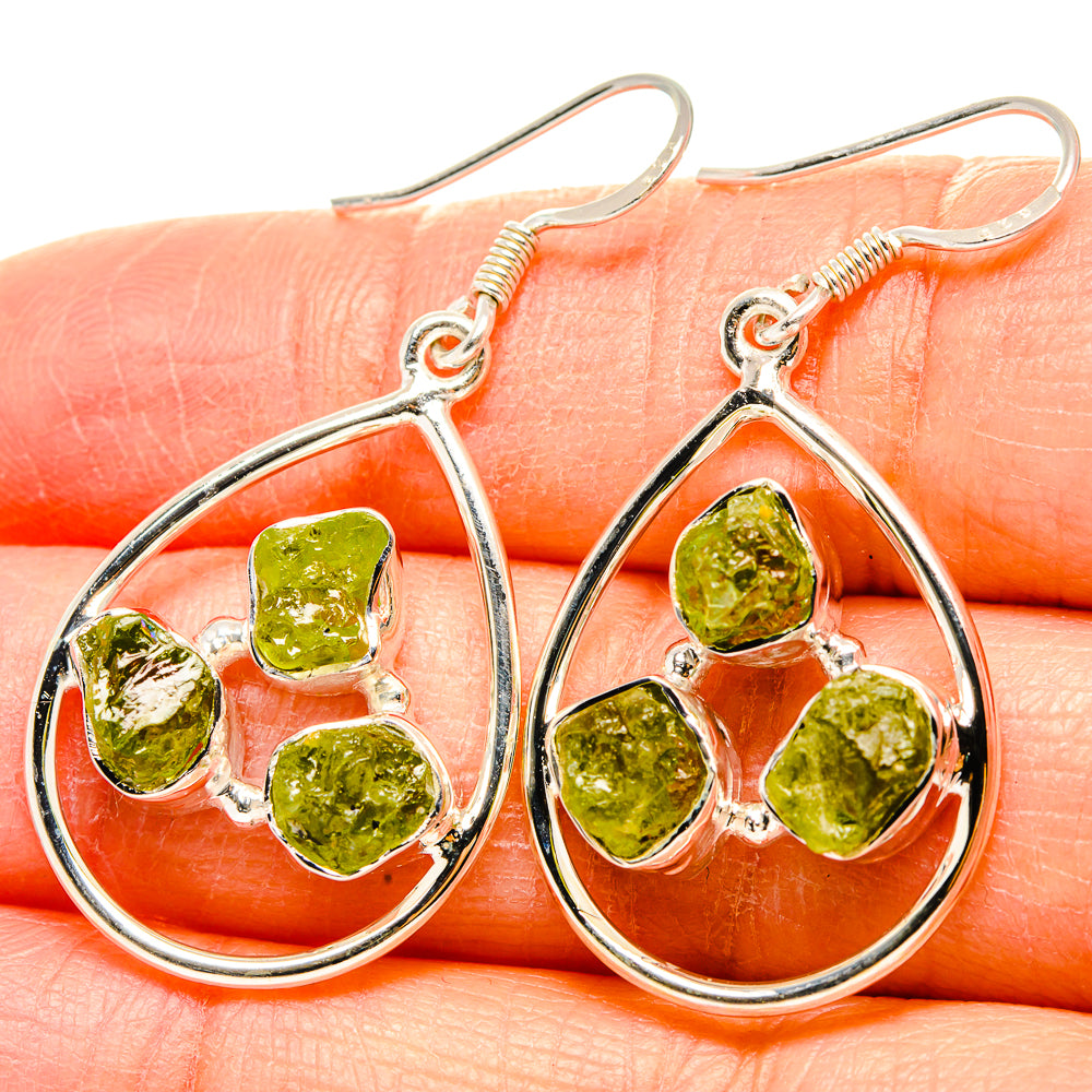 Sterling silver teardrop earrings with rough peridot green stones