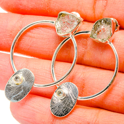 Sterling silver hoop earrings with rough white quartz and brushed oval dangles